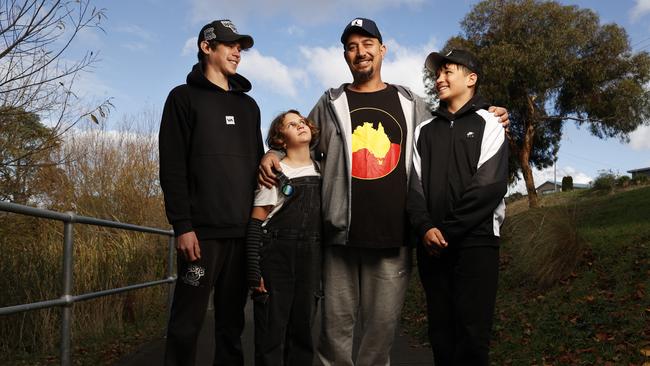 Adam Mills with children Desmond Pickett 17, Alithiya Pickett 10 and Draedyn Pickett 13. Adam Mills works officer with Glamorgan-Spring Bay Council who has triumphed in a battle to win his job back. Picture: Nikki Davis-Jones