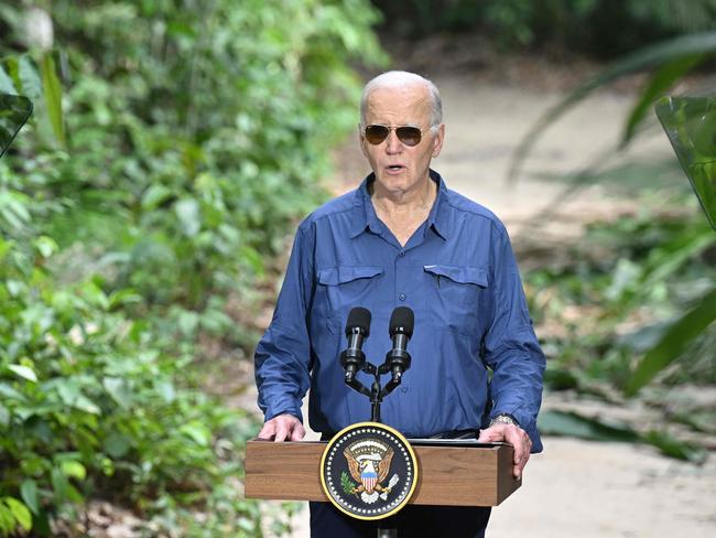 US President Joe Biden speaks after signing a proclamation designating November 17 as International Conservation Day during a tour of the Museu da Amazonia as he visits the Amazon Rainforest in Manaus, Brazil, on November 17, 2024, before heading to Rio de Janeiro for the G20 Summit. (Photo by SAUL LOEB / AFP)