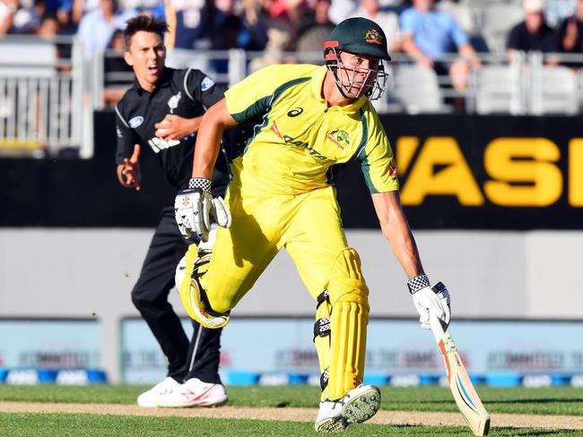 Marcus Stoinis of Australia takes a run as Trent Boult of New Zealand looks on in anguish in the Chappell Hadlee one day cricket match between the New Zealand and Australia at Eden Park, Auckland, New Zealand, January 30, 2017. (AAP Image/SNPA, Ross Setford) NO ARCHIVING, EDITORIAL USE ONLY