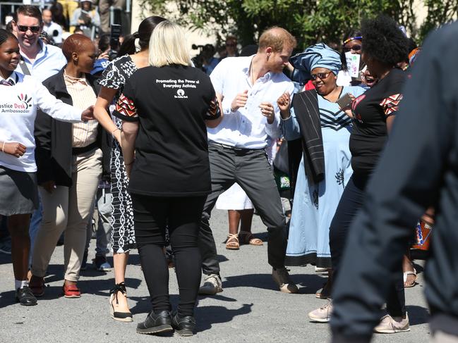 Harry’s dad dancing had Meghan in hysterics. Picture: Getty Images