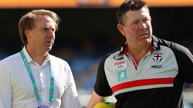 St Kilda CEO Matt Finnis and coach Brett Ratten talk during a training session in 2020.