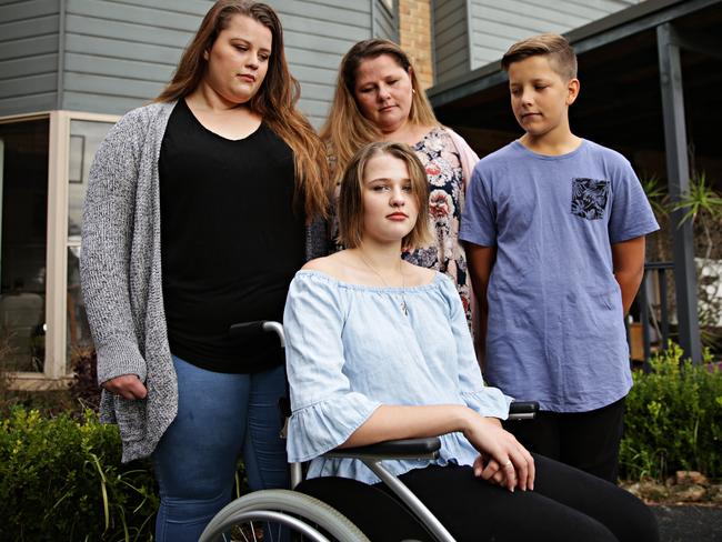 Danica McDougall (centre) with her (LR) sister Shae (19), mother Wendie and brother Kyan (12) at their home in Manly Vale. Picture: Adam Yip.