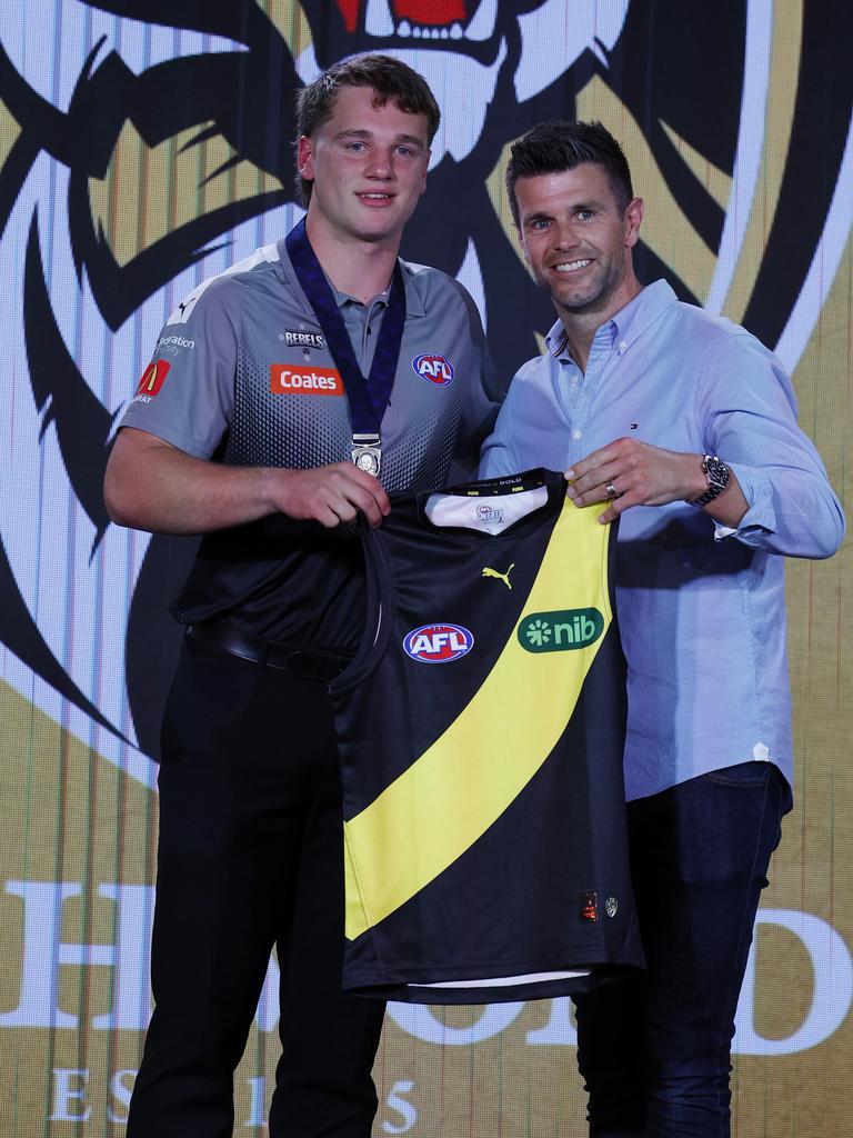 No. 1 pick Sam Lalor gets his jumper from Trent Cotchin. Picture: Michael Klein