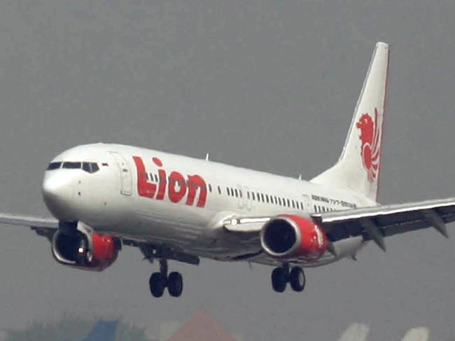 FILE - In this May 12, 2012 file photo, a Lion Air passenger jet takes off from Juanda International Airport in Surabaya, Indonesia. Indonesia's Lion Air said Monday, Oct. 29, 2018, it has lost contact with a passenger jet flying from Jakarta to an island off Sumatra. (AP Photo/Trisnadi, File)