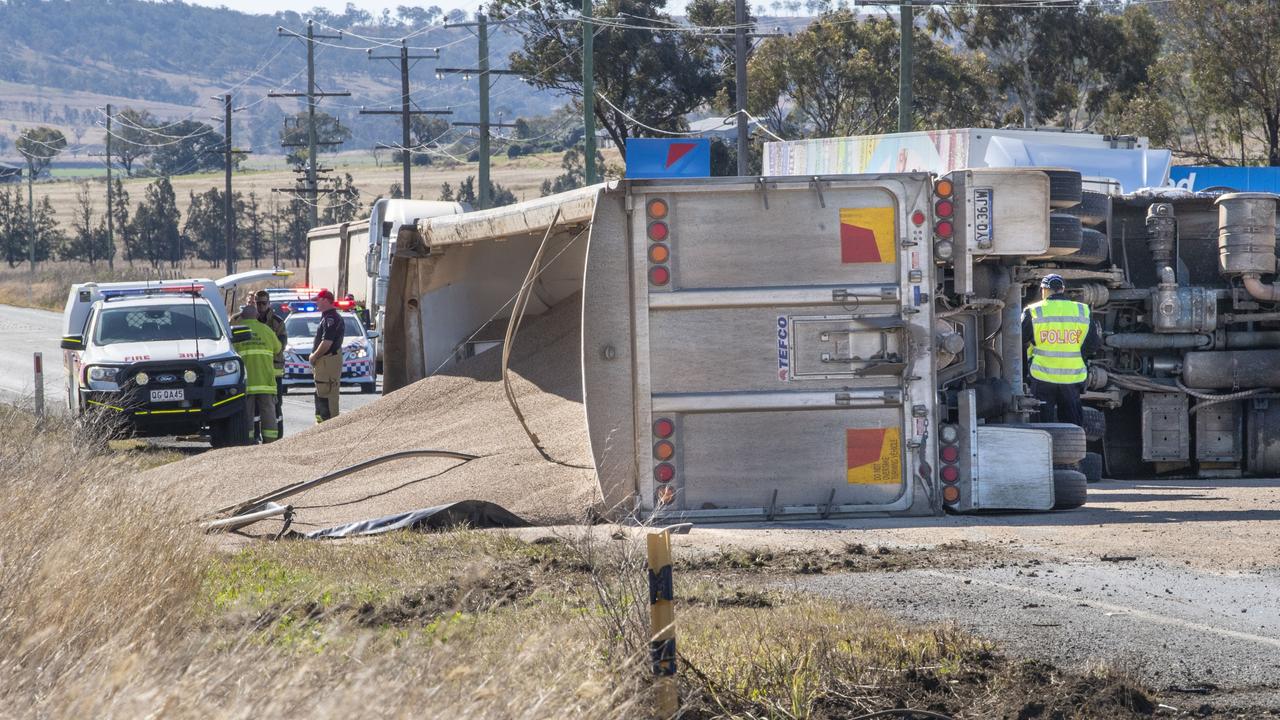 A large amount of chicken feed grain was split after the truck rolled. Picture: Nev Madsen.