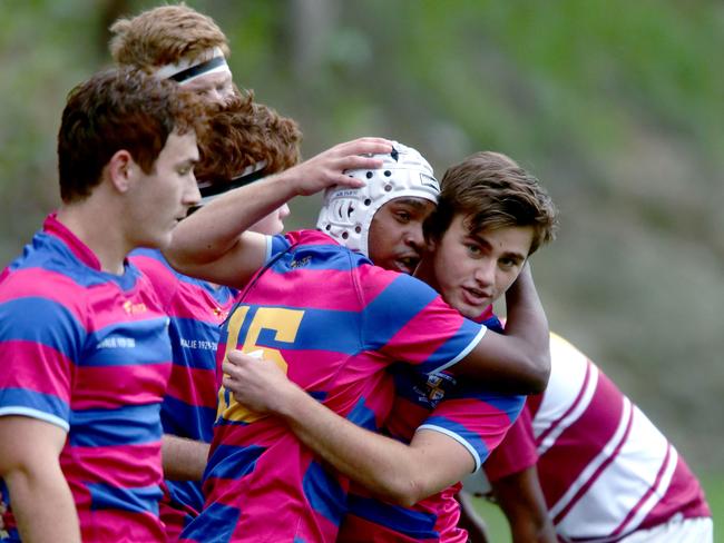 No. 15 Floyd Aubrey from Marist Ashgrove celebrates after a try. Picture: Image AAP/Steve Pohlner