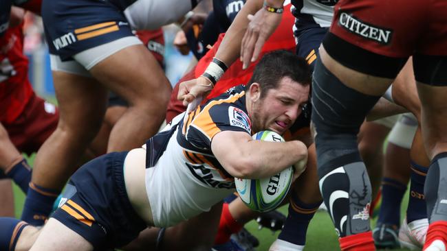 Connal McInerney on his way to one of his three tries. Picture: Takashi Aoyama/Getty Images