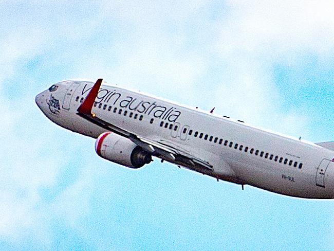 MELBOURNE, AUSTRALIA- NewsWire Photos APRIL 15 2021:  Virgin airline announce first International locations it will fly to from Australia once borders reopen. Virgin Flight takes off from Melbourne Airport.  Picture: NCA NewsWire / Sarah Matray