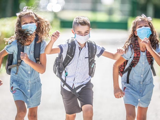 Face masks worn by grade three students and above will help reduce the spread, researchers said.