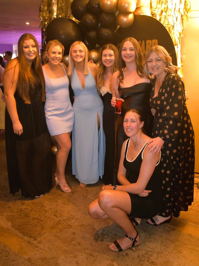 Tara Whelan, Sally Trew and friends having a great night at the Cowwarr Saints Football &amp; Netball Club Golden Gala Ball 2024. Picture: Jack Colantuono