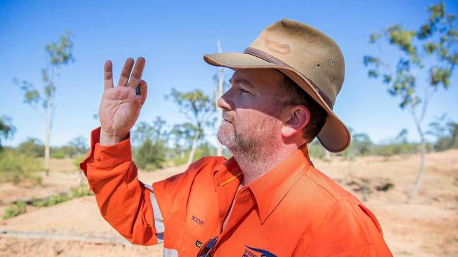 Dr Scott Hocknull examines a fossil at South Walker Creek. Picture: CONTRIBUTED