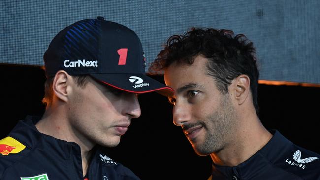 Red Bull Racing's Dutch driver Max Verstappen (L) and Australian Daniel Ricciardo