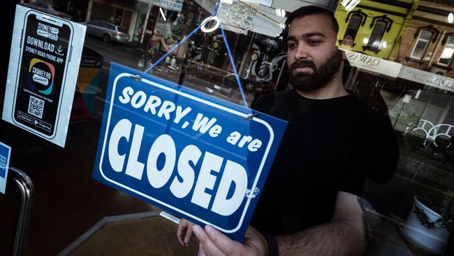 Mas Azemi was forced to close his business, Mas Barber Shop, for stage four restrictions. Picture: Getty