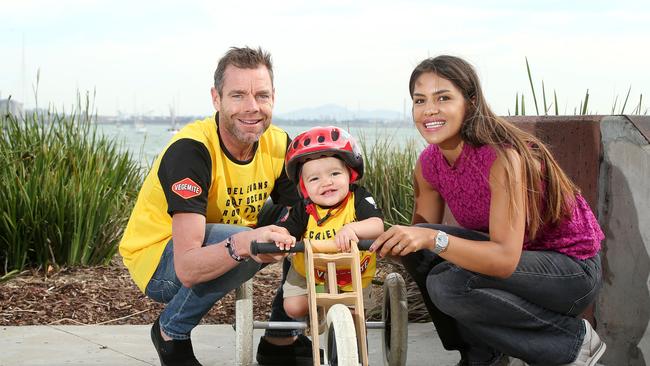 Stefania Zandonella with Cadel Evans and their son Aidan. Picture: Alison Wynd