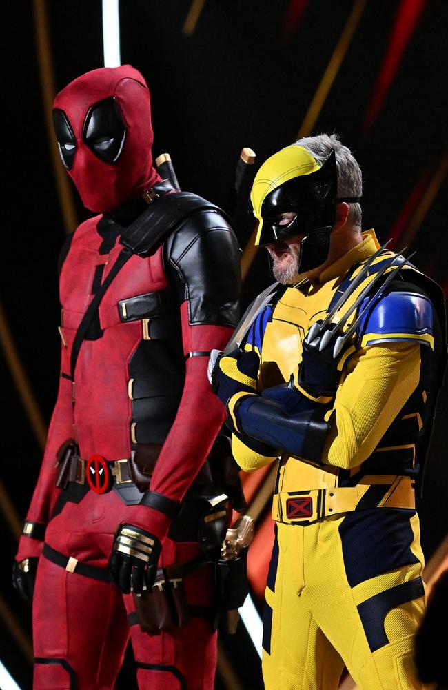 Andy Lee, dressed as Deadpool and Stephen Curry, dressed as Wolverine present the Logie Award for Best Lead Actor in a Drama. Picture: Getty