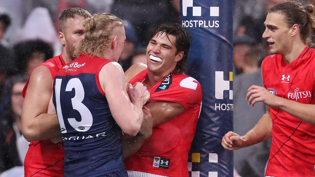 Tempers flare between Clayton Oliver and Sam Durham. Picture: Sarah Reed/AFL Photos