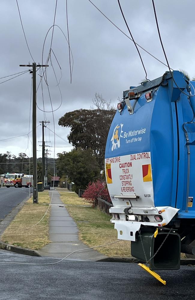 A garbage truck has taken out power lines after it hit a pole on the corner of Folkestone and Barton Street in Stanthorpe on Tuesday. Photo: Ergon Energy