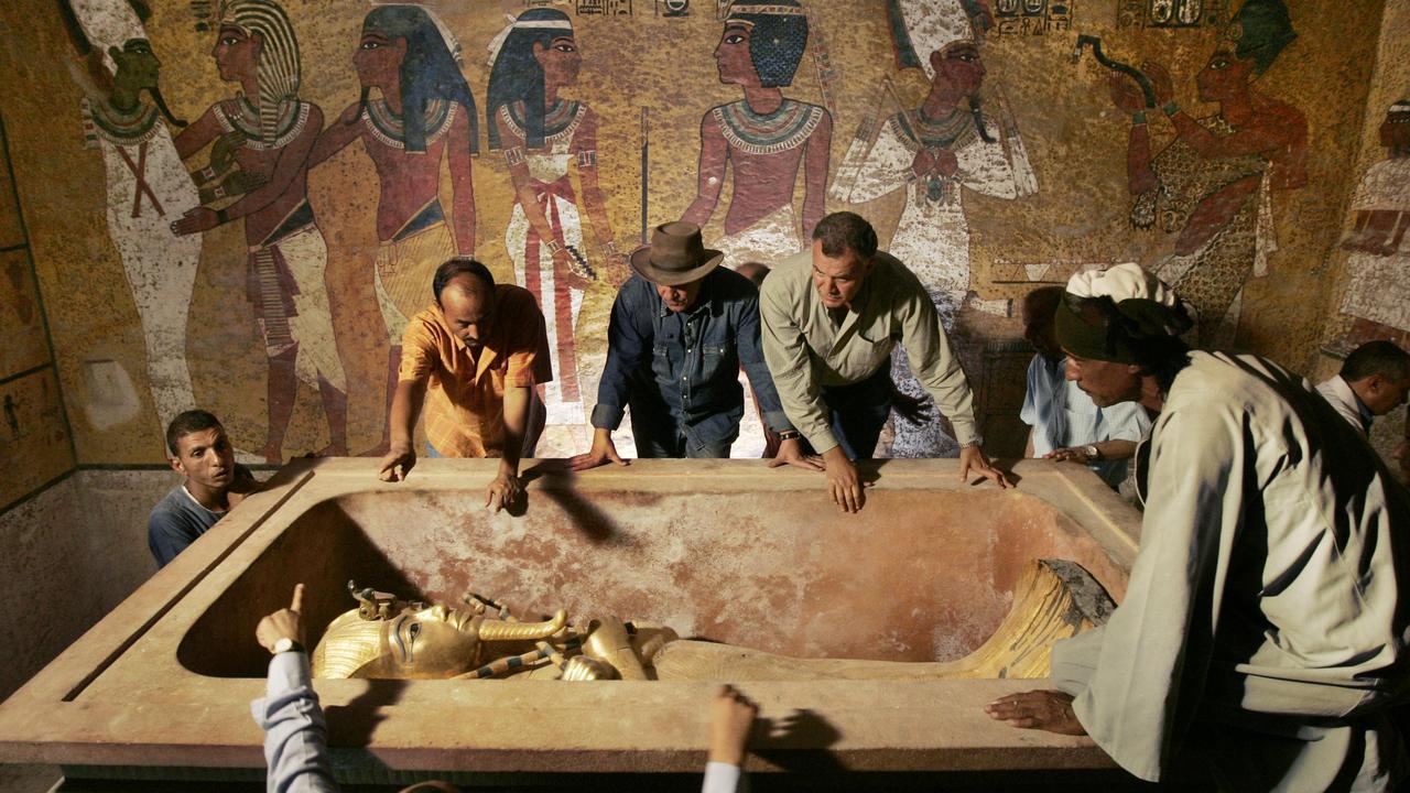 In this 2007 file photo, Egypt's antiquities chief Dr Zahi Hawass supervises the removal of King Tut from his stone sarcophagus in his underground tomb in the famed Valley of the Kings in Luxor, Egypt. Picture: AP