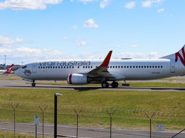 SYDNEY, AUSTRALIA - NewsWire Photos, SEPTEMBER, 05 2021: A plane is seen taking off at Sydney Domestic Airport as increased airplane noise could torment Sydney siders for years if a controversial plan to relocate airport traffic controllers to Melbourne goes ahead, a union has warned.  Picture: NCA NewsWire / Gaye Gerard