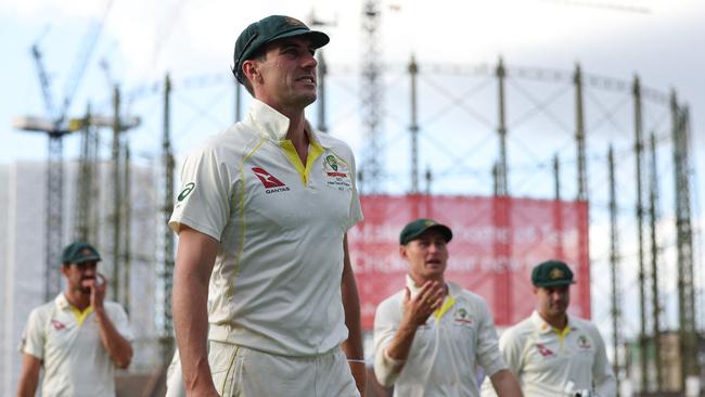 Pat Cummins leads his player in at the end of play on day three of the fifth Ashes cricket Test match between England and Australia at The Oval. Picture: AFP