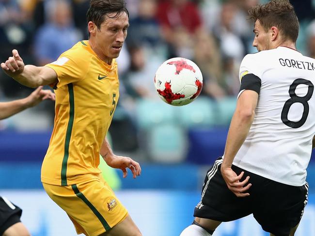 SOCHI, RUSSIA - JUNE 19:  Mark Milligan of Australia and Leon Goretzka of Germany battle for possession during the FIFA Confederations Cup Russia 2017 Group B match between Australia and Germany at Fisht Olympic Stadium on June 19, 2017 in Sochi, Russia.  (Photo by Alexander Hassenstein/Bongarts/Getty Images)