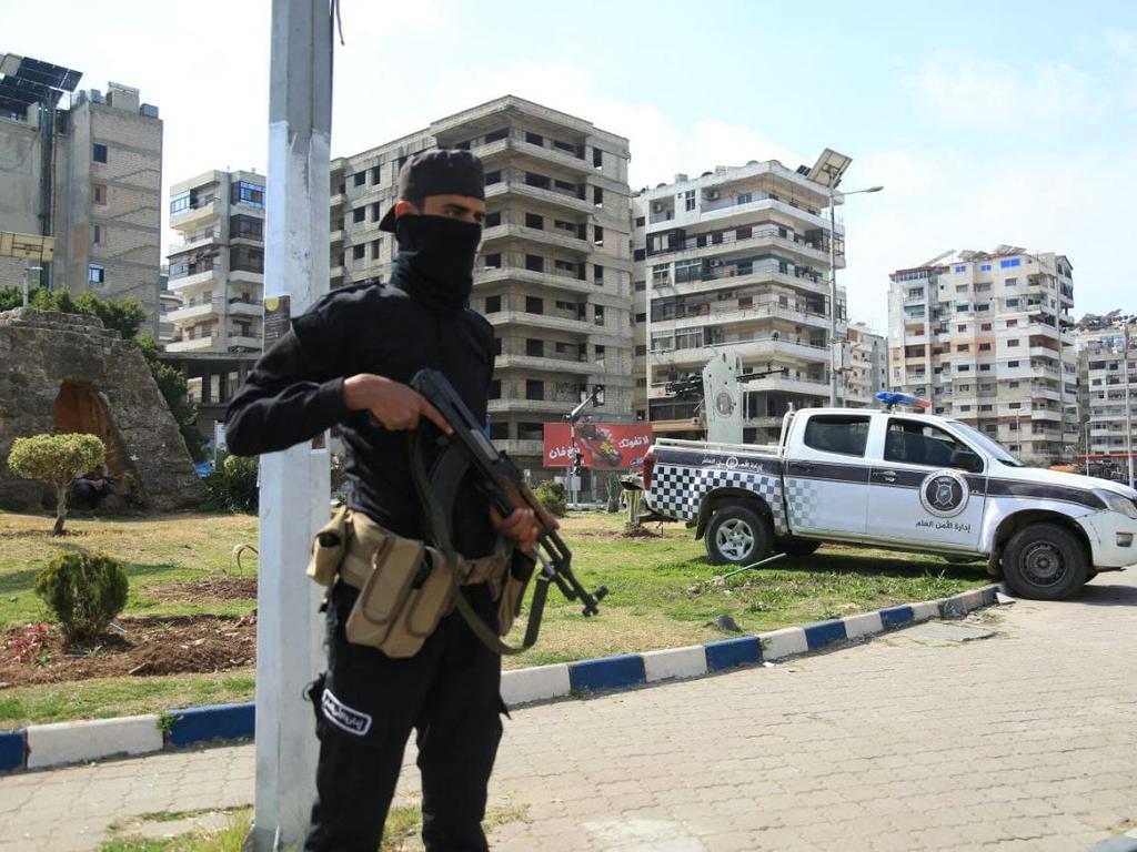 A member of the Syrian forces standing guard. Syrian President Ahmed al-Sharaa called for national unity and peace on March 9, after more than 1,000 people were reportedly killed. Picture: AFP