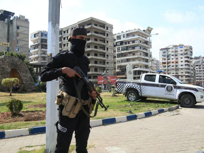 A member of the Syrian forces standing guard. Syrian President Ahmed al-Sharaa called for national unity and peace on March 9, after more than 1,000 people were reportedly killed. Picture: AFP