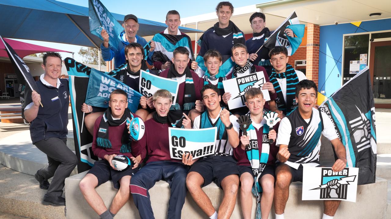 At Esava Ratugolea’s former school, St Mary of the Angel Secondary College in Nathalia, there are many Port supporters. (LtoR back row) Teacher John Nhill, Luca, Adam, Cristian, (Middle row), Acting Deputy Principal, Matt Dibble, Joseph, Eamon, Riley, Andre, William, (Bottom row), Samuel, Jack, Mikael, Ollie, and Rocco. Picture: Dean Martin