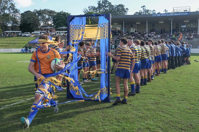 Seb Gardiner leads Ashgrove onto McMahon Oval. Picture: Stephen Archer