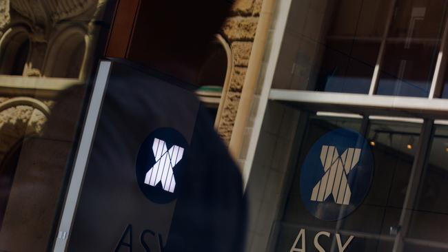 SYDNEY, AUSTRALIA - NewsWire Photos, October 29 2024. GENERIC. Stocks. Finance. Economy. People walk past the Australian Stock Exchange, ASX, on Bridge Street. Picture: NewsWire / Max Mason-Hubers