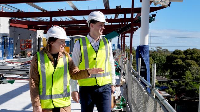 Ms Hurley and Mr Oakley admire the view from the top level of the $60m Hotel Panorama. Picture: Dean Martin.