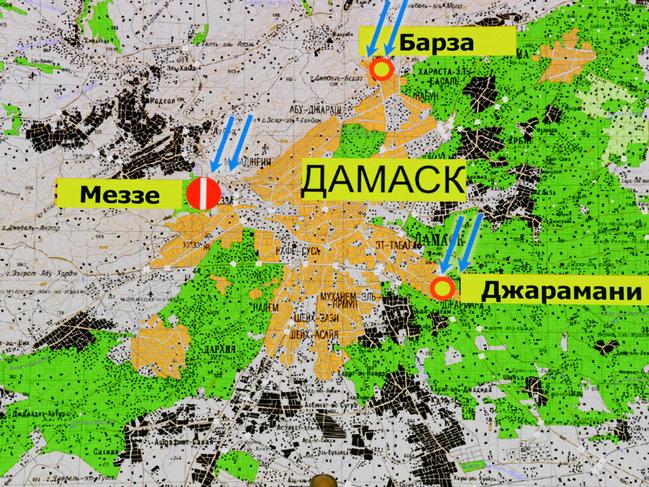 Russia's senior military officer Sergei Rudskoi sits before a map of Damascus, showing alleged strikes locations, during a briefing at the Russian Defence Ministry headquarters in Moscow on April 14, 2018. The Russian military said on April 14, 2018 that Western allies fired 103 cruise missiles including Tomahawk missiles at Syria but that Syrian air defence systems managed to intercept 71 of them. The US, Britain and France conducted joint strikes overnight on April 14 against the Syrian regime of Bashar al-Assad in response to alleged chemical weapons attacks. / AFP PHOTO / Kirill KUDRYAVTSEV
