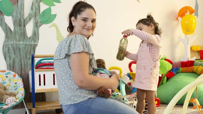 Peer support worker Molli Robinson and her daughter Armani Savea at the Young Mothers for Young Women centre in Caboolture. (AAP/Image Sarah Marshall)