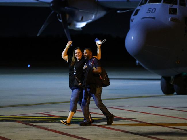 Evacuees from New Caledonia arrive on a RAAF flight at Brisbane Airport. Picture: David Clark