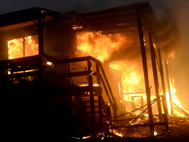 *FILE PIX* NCA NewsWire Photos: Residents and firefighters fight a bushfire that has threatened homes in Rainbow Flat on NSW Mid North Coast. Picture: NCA NewsWire / Jeremy Piper