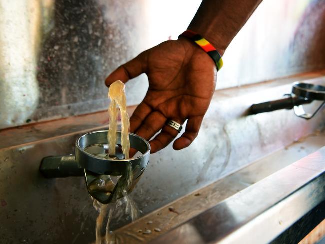 Discoloured water comes out of the drinking fountains at the Minyerri school. The Minyerri community is located some 480 kms southeast of Darwin. Picture: Justin Kennedy