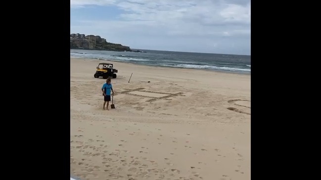 Bondi Lifeguards Write 'Stay Home' in Sand as Beach Closed for coronavirus Outbreak