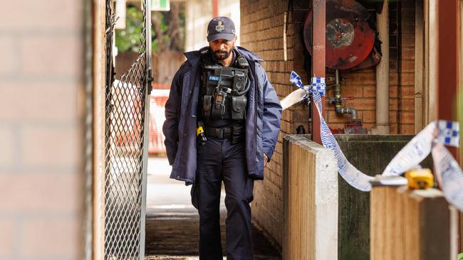 Police at the scene of a unit fire on Kent Street, New Farm. Picture: Lachie Millard