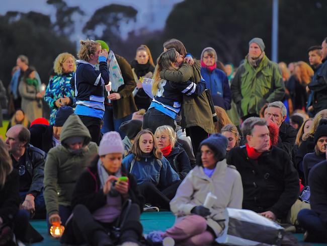 Friends hug at the Reclaim Princes Park vigil for Eurydice Dixon. Picture: Jason Edwards