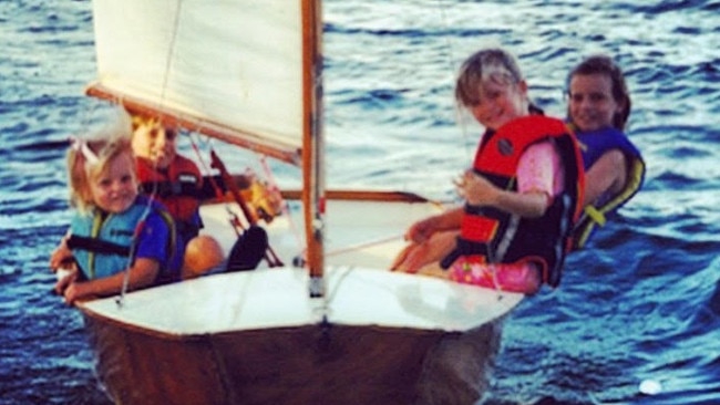 Will Ryan and his sisters on their little wooden boat. Pic: Supplied.