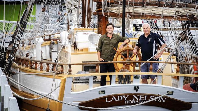 Australian Wooden Boat Festival general manager Paul Stephanus and boating enthusiast Mal Riley on the Lady Nelson in Hobart. Picture: Chris Kidd