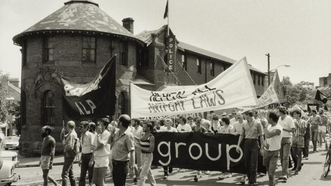 A photos of protesters marching outside the police station in 1979.