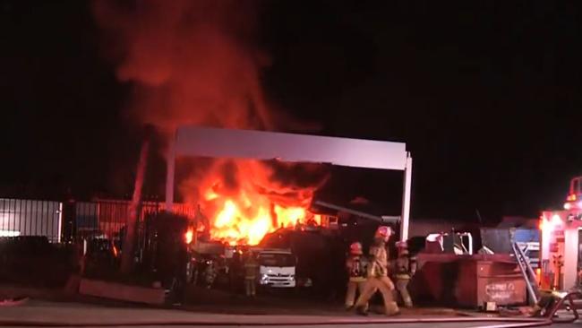 Fire has torn through a scrap metal yard in Molendinar overnight. Picture: 7 News