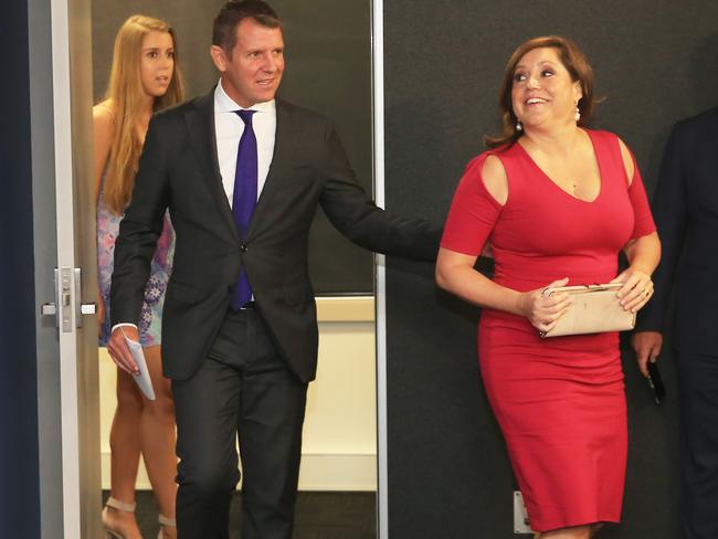 Mr Baird arrives with wife Kerryn and daughter Kate to announce his retirement. Picture: Mark Evans