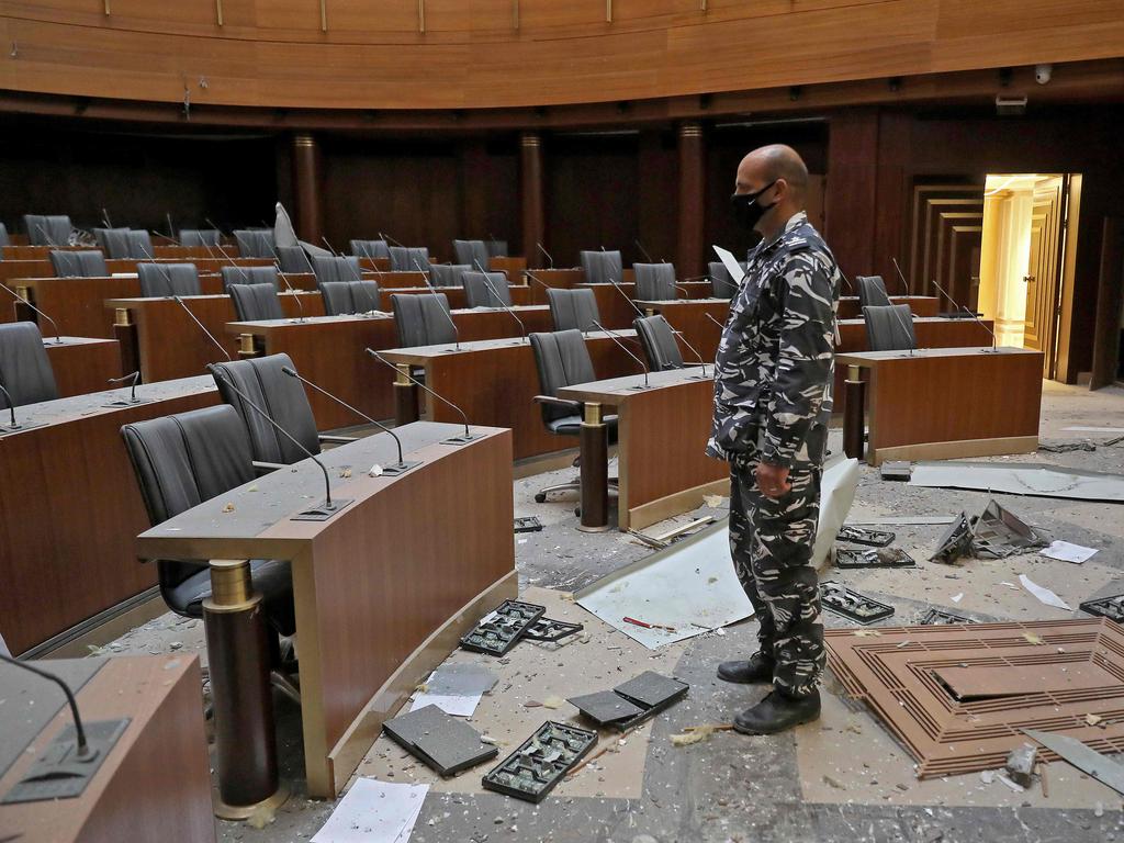 A member of the Lebanese security forces inspects damages in the parliament building in the central district of the capital Beirut. Picture: ANWAR AMRO / AFP