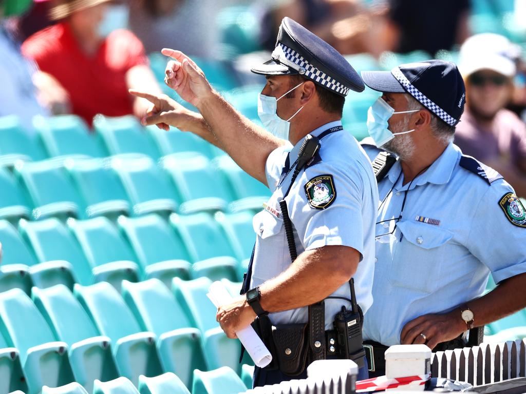 Police monitor the crowd following a complaint by Mohammed Siraj. (Photo by Cameron Spencer/Getty Images)