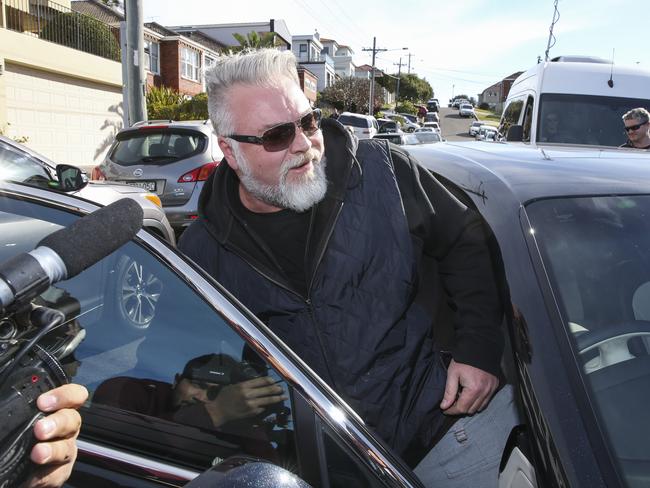 Kyle Sandilands turns up at John Ibrahim's house in Dover Heights during the police search. Picture: Justin Lloyd.