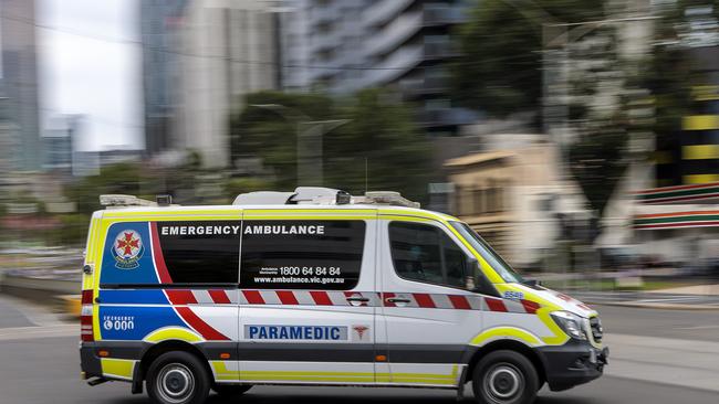 A man in his 50s has been taken to The Royal Melbourne with serious upper body injuries after rolling his truck on the Hume Freeway on November 16. Picture: NCA NewsWire / David Geraghty