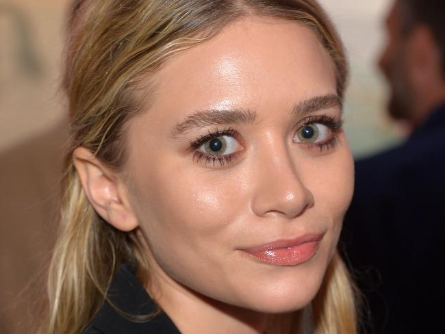 LOS ANGELES, CA - JANUARY 10: Actress Ashley Olsen attends Diane Von Furstenberg's Journey of A Dress Exhibition Opening Celebration at May Company Building at LACMA West on January 10, 2014 in Los Angeles, California. (Photo by Charley Gallay/Getty Images for Diane Von Furstenberg)