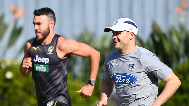 Richmond’s Shane Edwards and Geelong’s Gary Ablett train together on Friday